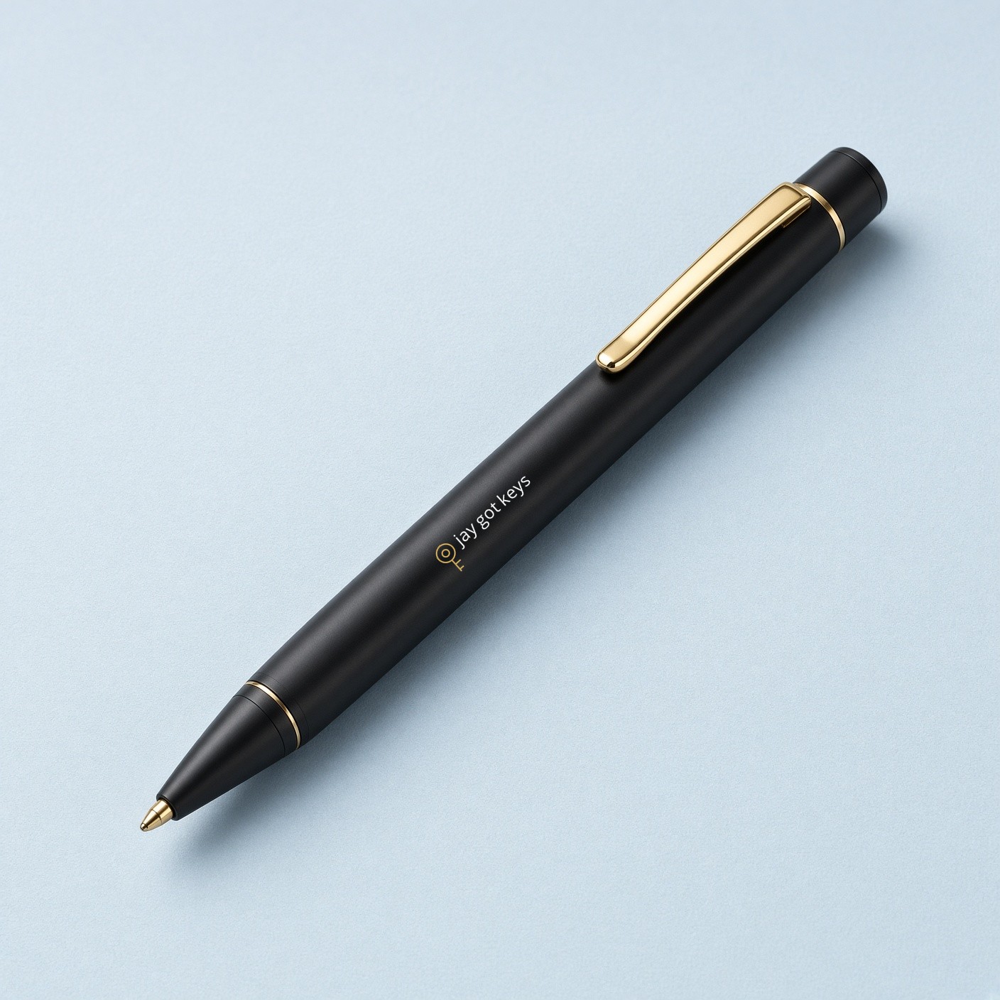 Black metal pen with jay got keys logo on the barrel